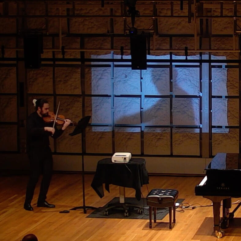 Penderecki's Ciaccona for Violin and Viola, performed with my shadow at my final Master's recital